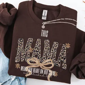 Custom This Mama Wears Her Heart On Her Sleeve Sweater, Personalized Mom With Kids Names Apparel, Motherhood Hoodie, Mother's Day Gifts