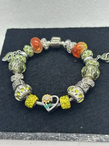 Sunflower Charm Bracelet with Colorful Beads and Sparkling Heart Design Featuring Sunflower Motif and Vibrant Beads