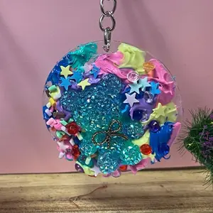 Cream Glue Keychain - Colorful Decorative Accessory with Stars and Glitter Design. Mystery cream glue keychain.