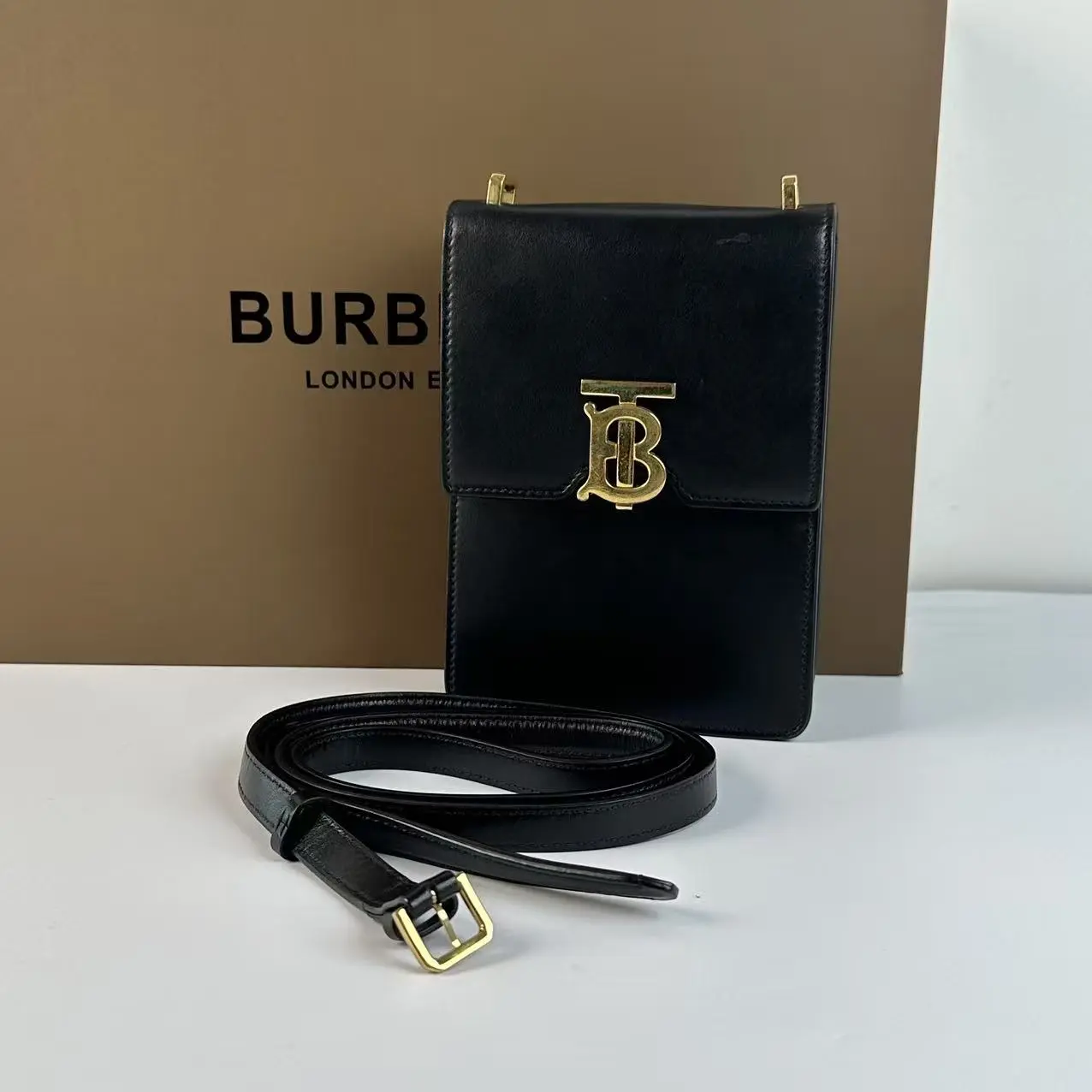 Pre-owned BURBERRY Black Smooth Leather TB Metal Logo Vertical Crossbody Bag