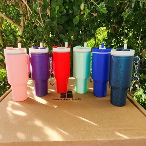 Tumbler keychain with hidden compartment