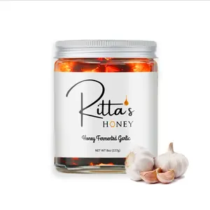 Ritta's Honey - Fermented Garlic Honey to Enhance Meals and Overall Wellness. 100% Pure, Nutrient Rich Raw Califonia Wild Flower Honey with organic Fermented Garlic Cloves. Flavor Sweet