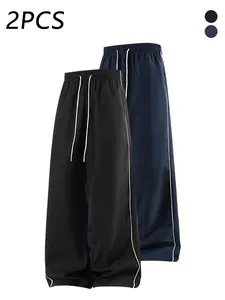 2-pack men’s casual athletic pants with side stripes, adjustable drawstring elastic waistband, loose straight-leg fit