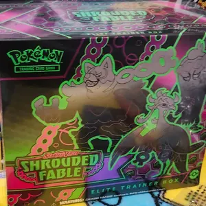 Shrouded Fable Elite Trainer Box - Collectible Card Game with Unique Design and Character Features
