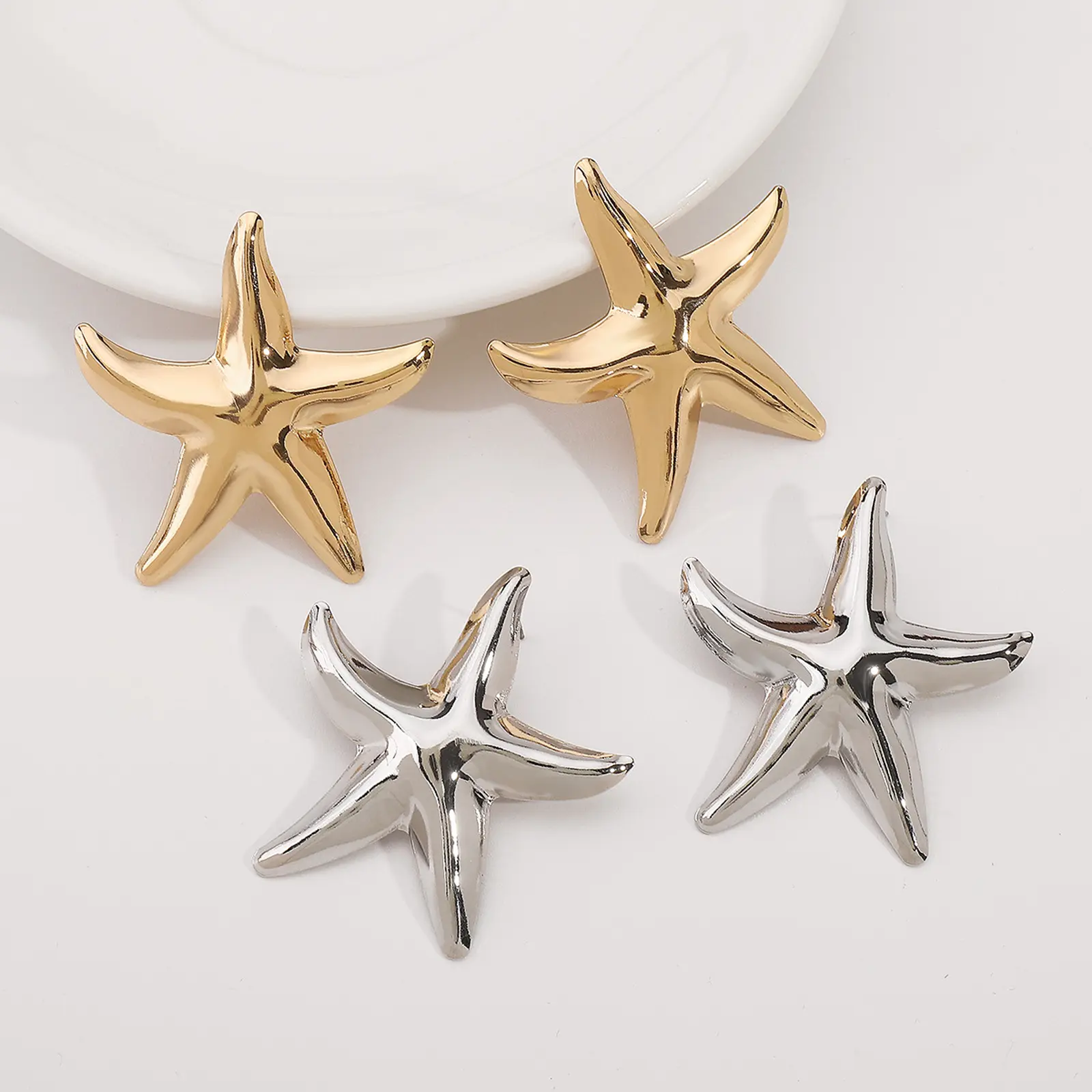 Alloy earrings golden/silver starfish earrings for pierced ears, earrings for women to wear daily as a gift