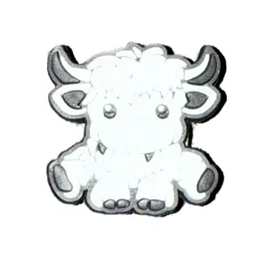 Fluffy Black and White Highland Cow Sitting Shoe Charm for Adorable Footwear Accessory