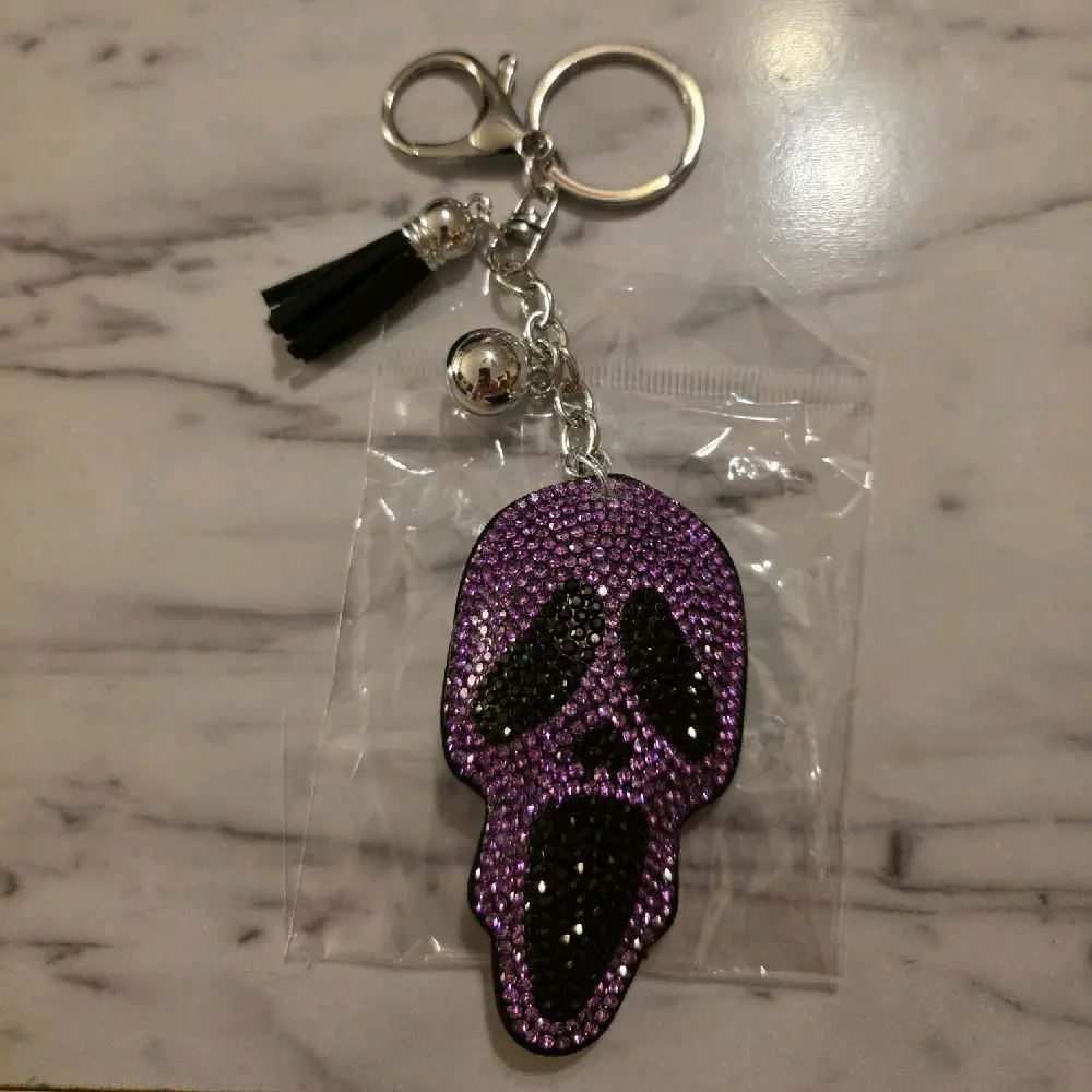 Purple Skull Keychain with Black Tassel and Silver Bell