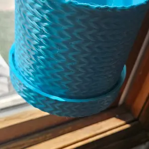 The "Sweater Guy" Window Suction Planter 4 Inch Round with Drip Tray for Indoor Plants Compact Design Suction Mechanism Versatile Use PETG