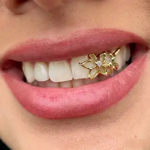 Personalized and fashionable braces, double gold teeth with hollow flower design, cool tooth decorations ornaments for Halloween Party