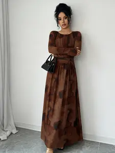A women's brown fashionable casual ink wash pleated Womenswear dress with pleated elements adding layers, long sleeved design for sun protection, suitable for commuting to work, shopping and outdoor activities, indoor and outdoor dressing