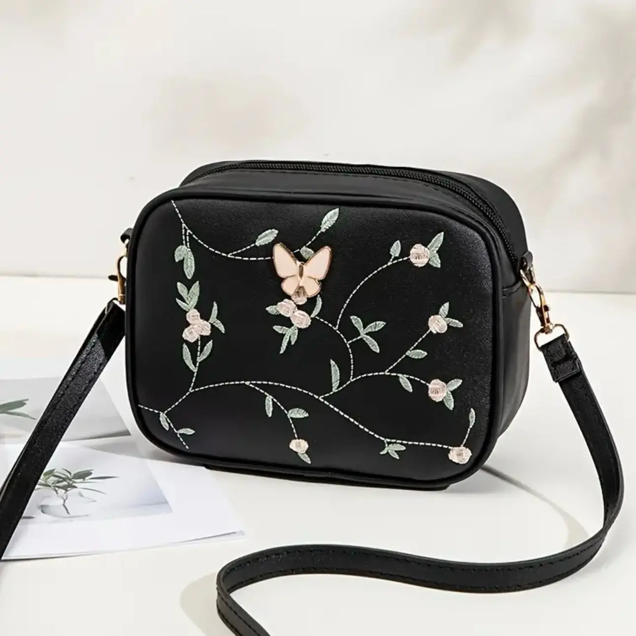 Embroidered shoulder bags designer