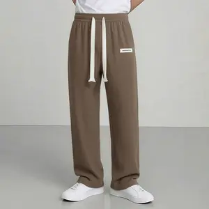 Men’s American vintage corduroy straight-leg pants—trendy, versatile brown casual long trousers with a drawstring waist and loose fit; simple, stylish men’s bottoms suitable for everyday wear and sports.