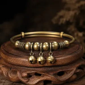 A vintage-style geometric bell bracelet-an accessory designed to soothe the mind and alleviate stress.Featuring a convenient push-and-pull adjustable design, this bracelet symbolizes wealth and good fortune, serving as a vessel for heartfelt blessings.