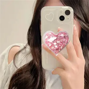 Cute Pink Heart-Shaped Expanding Phone Grip - Finger Snap Grip Holder for Kindle, iPhone - Quicksand Glitter Collapsible Phone Mount Holder Stand for Girls Women, Lovely Phone Charm and Accessories