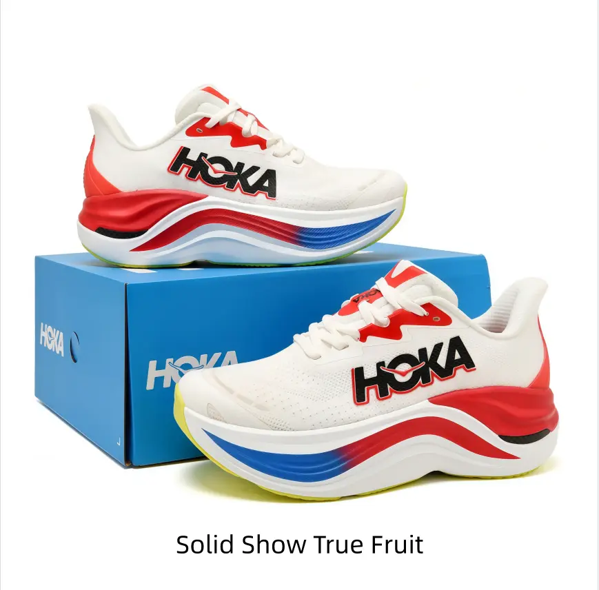 Cream white running shoes with bold red and blue wavy midsole, cushioned thick sole, classic color matching for sporty daily street looks