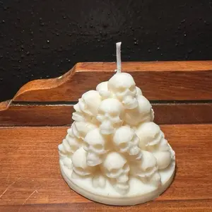 Pile of skulls candle