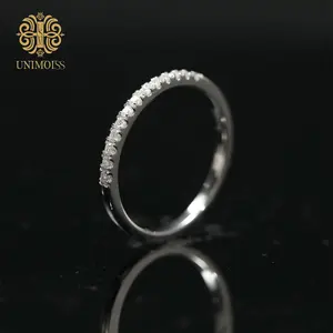 Unimoiss 13-stone ring featuring round-cut, D-color, VVS-grade lab-created moissanites. Crafted with a multi-stone setting in hypoallergenic and tarnish-resistant S925 sterling silver, this unisex ring is designed for versatile stacking and everyday wear​
