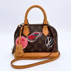 Pre-owned Louis Vuitton canvas Crossbody Bags Monogram World Tour Stickers Alma BB