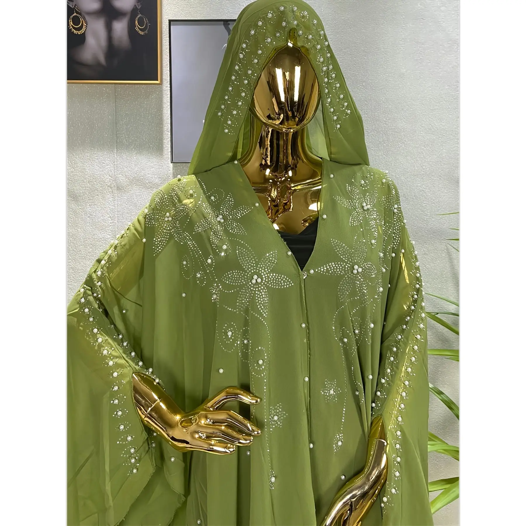 Sparkling Sequins And Rhinestones in a Spring Collection Featuring a Loose, Trendy Cape with Bell Sleeves, Inspired by Middle Eastern, African, And So