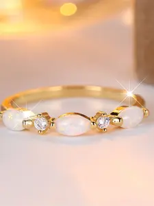 An oval-shaped white synthetic Opal is fashionable and simple, suitable for women to wear at travel wedding parties, Engagement Wedding Jewelry