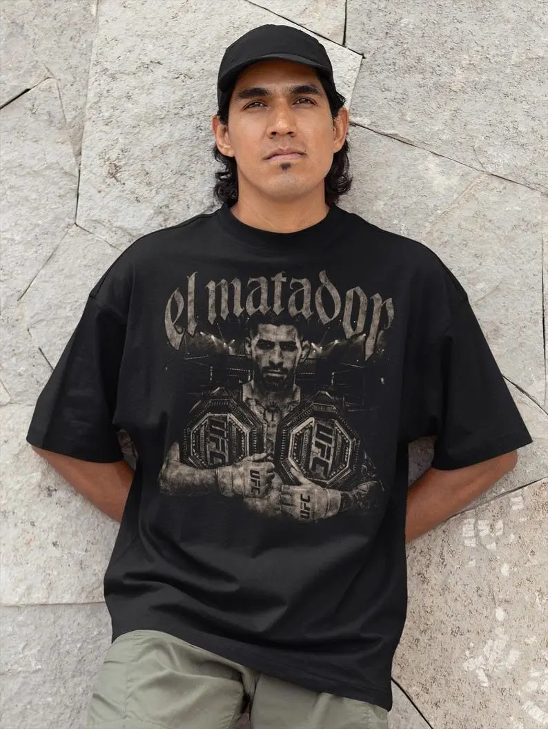 [Sale off up to 50%] Ilia Topuria Shirt - Double Champ Shirt – Vintage Oversized UFC Tee, Ilia Carrying Two Belts, MMA Fan Gift, Fight Night Streetwear T-Shirt, Graphic Streetwear T-shirt