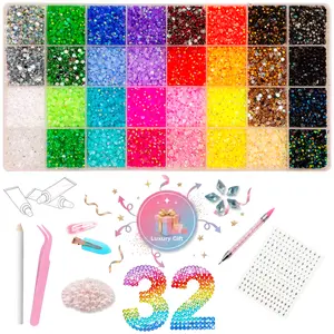 Color Jelly Rhinestone Bedazzling Kit -32Colors, 40000+ 3mm Resin Rhinestones for Nail Art, Phone Cases, Jewelry Making & DIY Crafts. Includes Dual-Ended Pick Up Pen, Tweezers, 2 Hair Clips, 50 Half-Round Pearls, 5 Blue Rhombus Gems & Star Nail Stickers.
