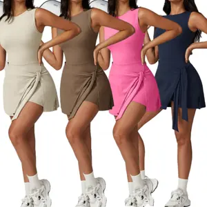 Women's Solid Color Sleeveless Tennis Dress with Ruffle Side Slit Built-in Shorts Lace Up Available in S-XL Comfortable Summer Wear for Running Exercise