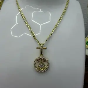 Cadena de 20” aproximadamente con dije la milagrosa en oro chapado