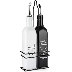 Oil and Vinegar Dispenser Set (2x500ml) Black & White Bottle stainless steel spouts & top. Our oil dispenser set is modern design fits every kitchen Container