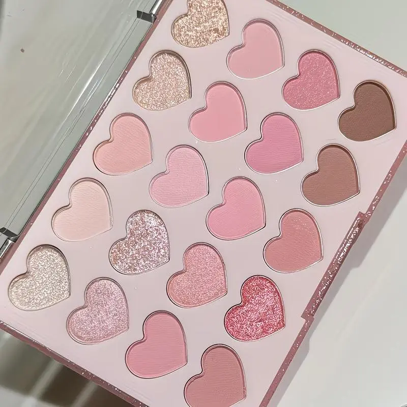 Who can resist a palette full of hearts! Girl's heart overload! Pink-toned milk tea eyeshadow palette, 20-shade heart-shaped eyeshadow palette—shimmery and matte finishes, one palette handles all your daily makeup looks.