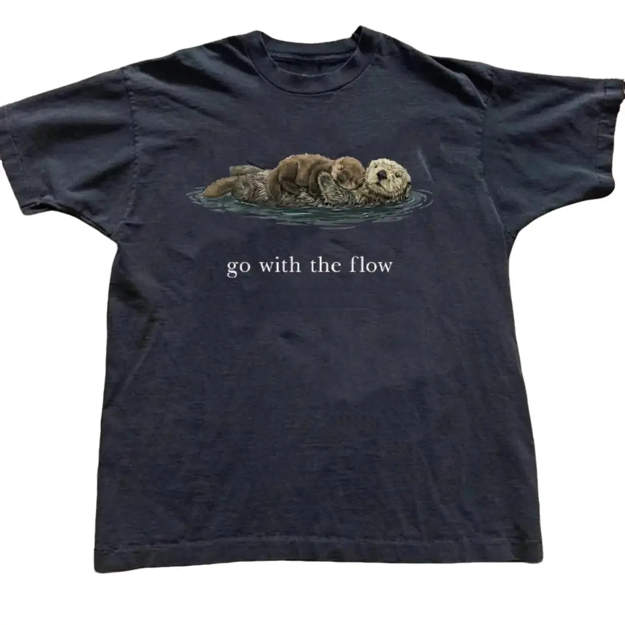 National Geographic with "Go with the flow" Tee
