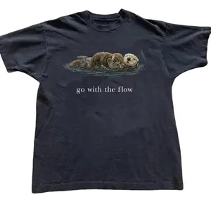 National Geographic with "Go with the flow" Tee