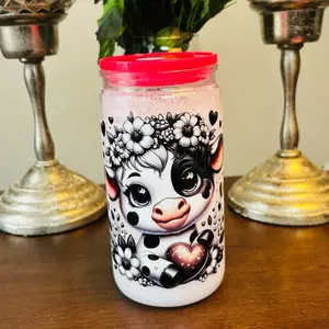 Cows Milk 16oz Snowglobe Tumbler with Floral Design and Red Lid