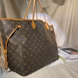 Pre-owned Louis Vuitton Monogram Neverfull GM Tote Bag Iconic Coated Canvas & Vachetta Leather 2 in 1 Design Ideal for Commuting & Travel Authentic Pre Owned