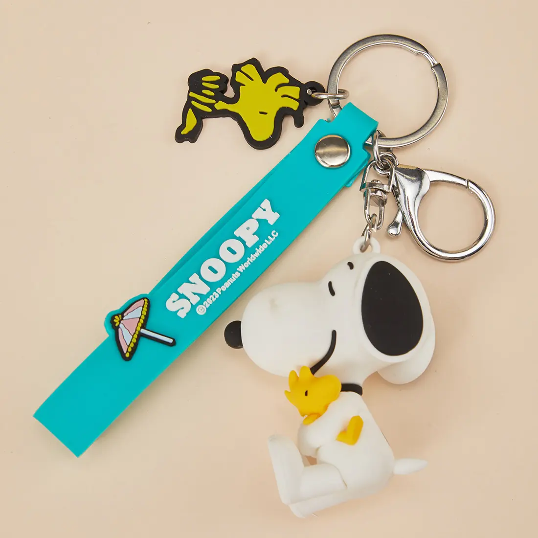MINISO Cute Snoopy Summer Series 3D Cartoon Bag Charm Keychain, suitable for keys and backpacks; a lovely gift for Snoopy fans (sitting).