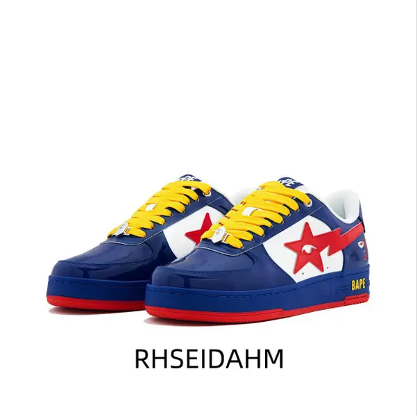 Bold blue white red low top sneaker, red star accent, glossy blue upper, yellow laces, white chunky midsole, red outsole, lace up front, streetwear footwear