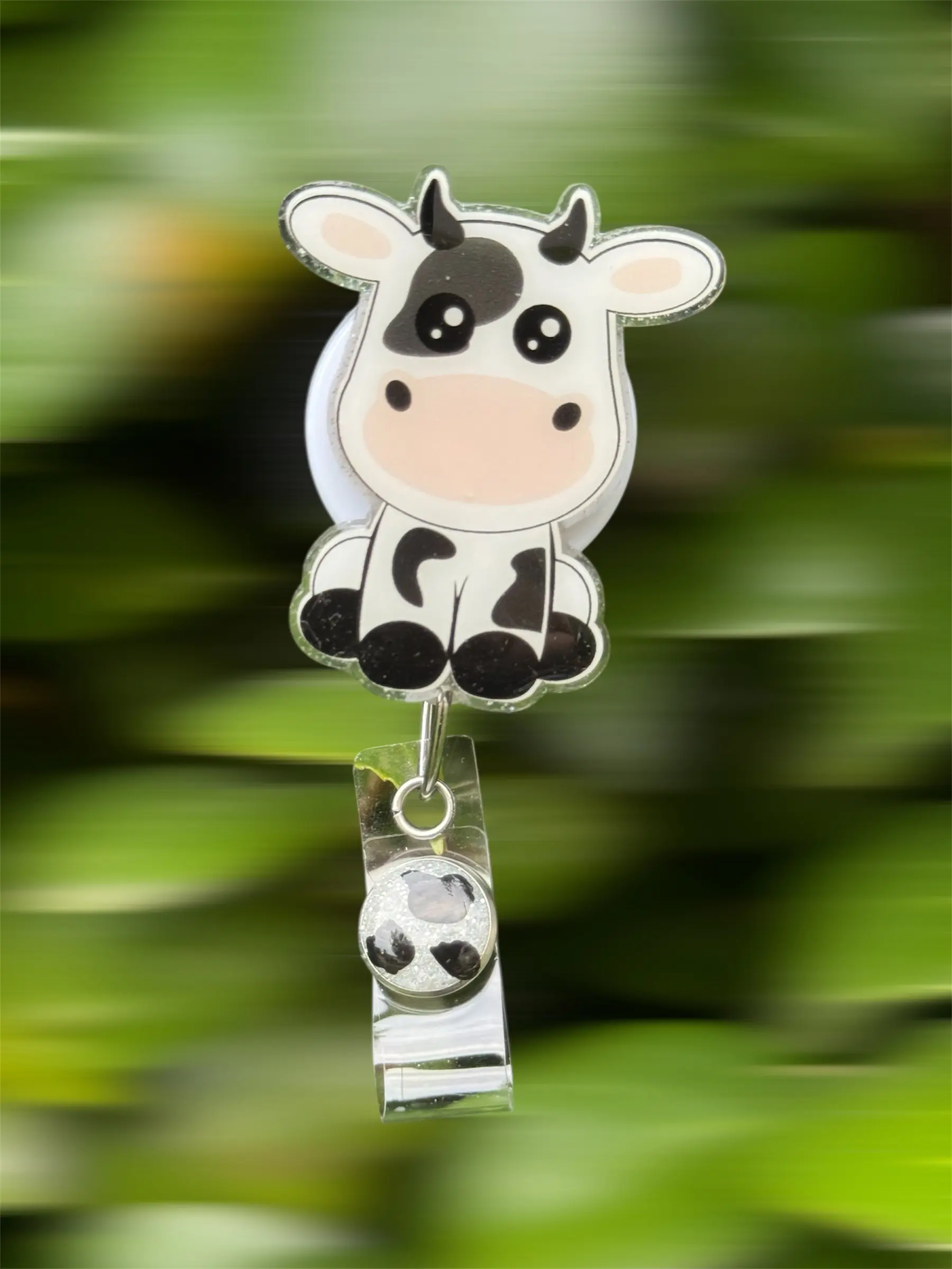 Sitting Cow Badge Reel - 2”, Retractable Swivel Alligator Clip, Cute Cow Character with Black and White Design, Ideal for Gifts and Decorative Use