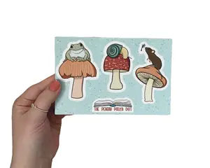 cottage core sticker sheet, vinyl stickers of critters sitting on mushrooms, frog snail and mouse sitting on mushrooms, hand drawn