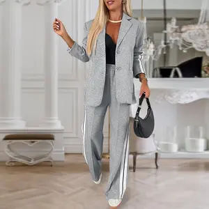 Women’s striped blazer and wide-leg pants set featuring sporty side tape, a notched front collar, front buttons, and pockets