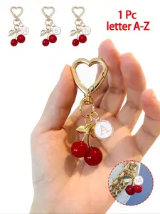 Stylish, high-quality, cute cherry gold butterfly bag charm - cherry key fashion backpack pendant decoration, keychain, bag charm alloy pendant A-Z letters, cherry keychain, bag accessory, suitable for women's wallets and bags, backpack accessories.