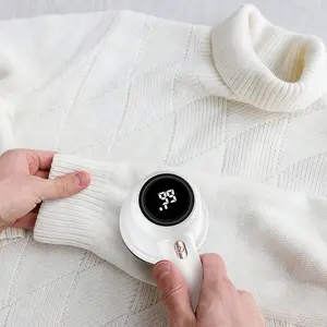 Rechargeable fabric shaver and electric lint remover features LED digital display, large capacity lint container, 3-speed adjustment, non-slip easy-grip handle, high-end color matching and comes with 2 extra blades.