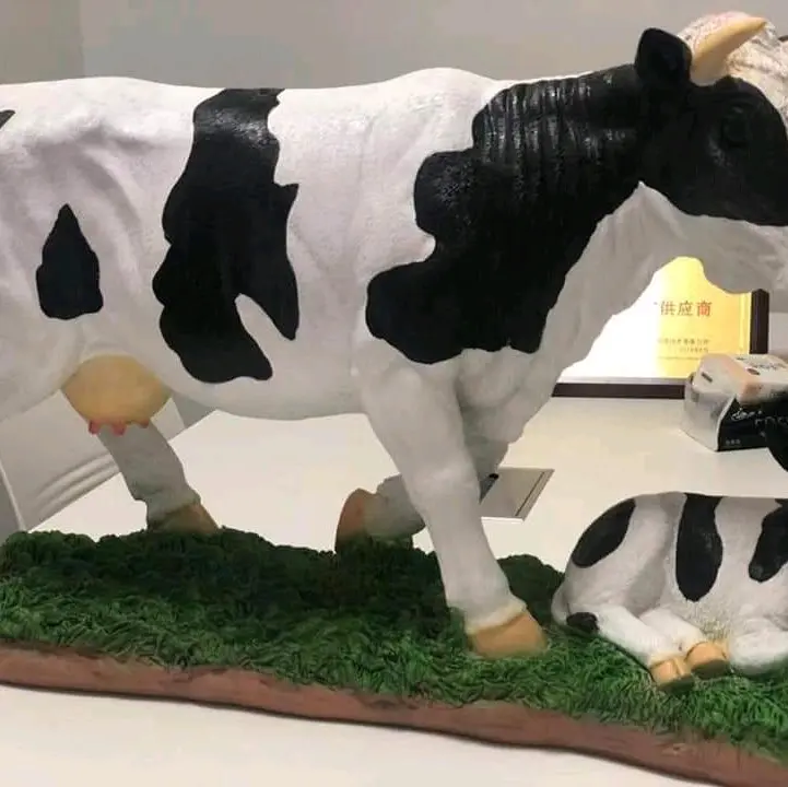 make of fiber glass cow with baby cafe