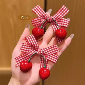 2 red cherry bow hair clips in a sweet style, suitable for daily use