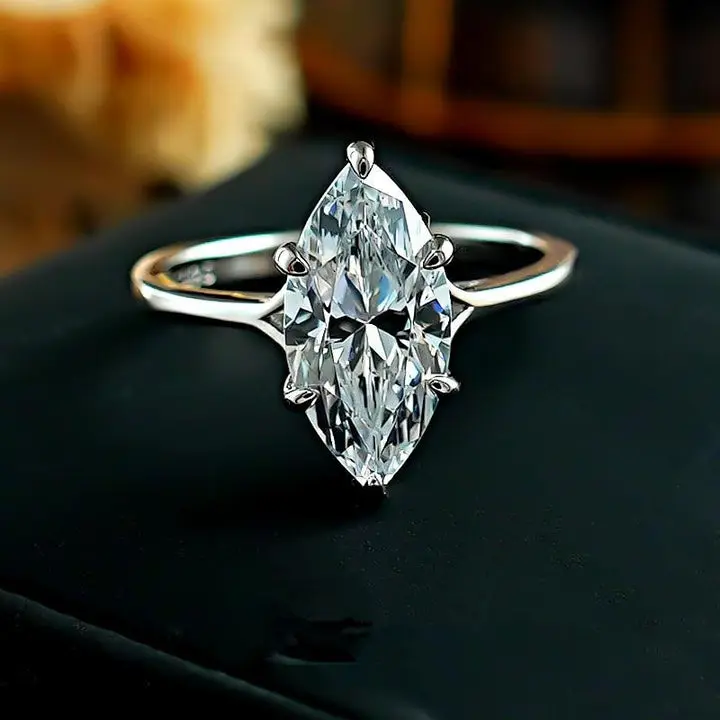 marquise cut ring, solitaire engagement ring, gold statement ring, minimalist ring, elegant crystal ring, timeless jewelry, classic engagement ring, luxury fashion ring, silver gold ring, daily wear fine jewelry
