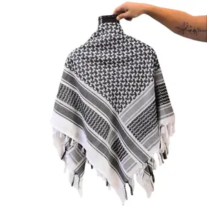 Traditional woven Palestinian Keffiyeh, Kufiya, Shemagh, or scarf with classic Palestinian patterns