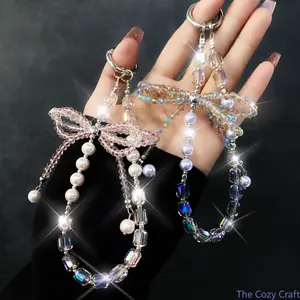Elegant 3D Crystal Bow Bag Charm, Pearl Beaded Wrist Phone Lanyard, Trendy Luxury Key Chain Accessory, Dainty High‑End Decorative Strap, Stylish Girly Hanging Ornament for Women’s Handbags, Cell Phones, Keys, Daily Commute and Fashion Styling outdoorfun