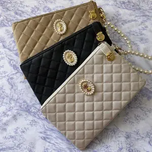 Quilted Pearl Wristlet Pouch - Detailed Product Information Not Provided