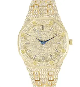 The dial is gold with embedded diamonds and has an oval bezel. The case size is 41mm. It features a diamond bracelet and is a stylish and elegant mechanical watch.