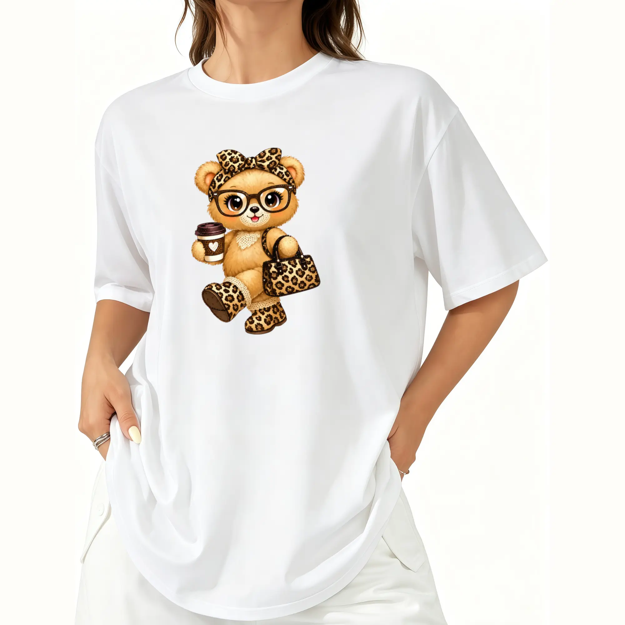 Meet your new everyday statement tee. this relaxed-fit graphic t-shirt features an adorable luxe teddy bear print with chic leopard accents for the pertect cute-meets-baddie vibe. designed with a comfy oversized silhouette that pairs ettortlessl