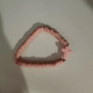 Pink cross bracelet